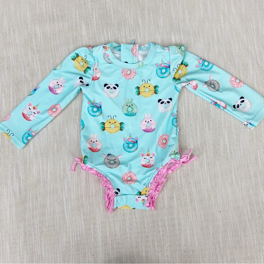 Posh Peanut Animal Donuts Long Sleeve Ruffled Rash Guard One Piece Swimsuit